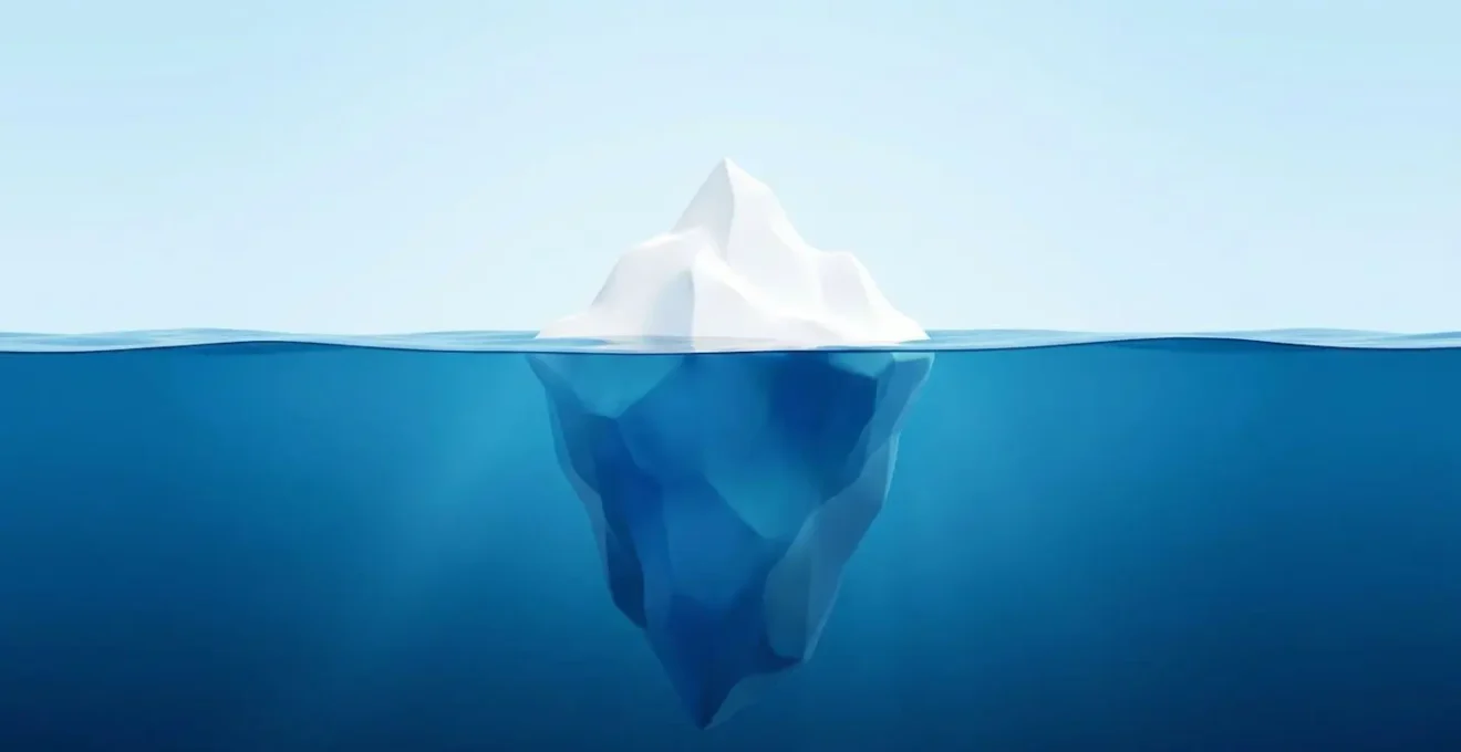 Iceberg stylisé en 3D avec petite pointe blanche émergée et masse immergée bleue massive sous la ligne d'eau, proportions exagérées pédagogiquement